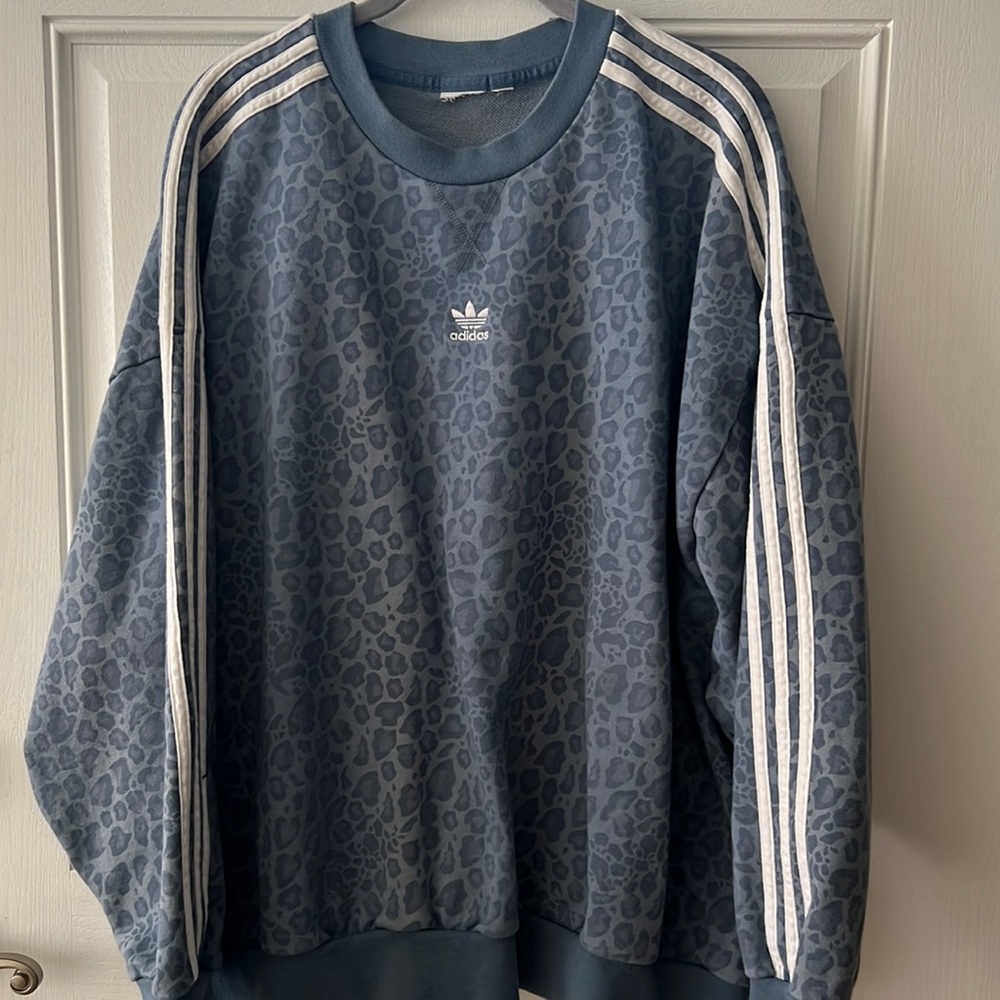 Adidas blue animal print sweatshirt.